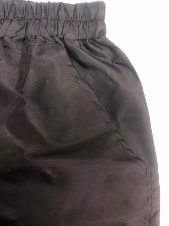 1500 - Spodnie treningowe nieprzemakalne kieszeń z przodu